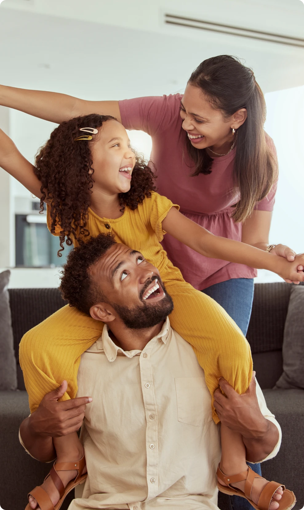 Family enjoying playful time at home.