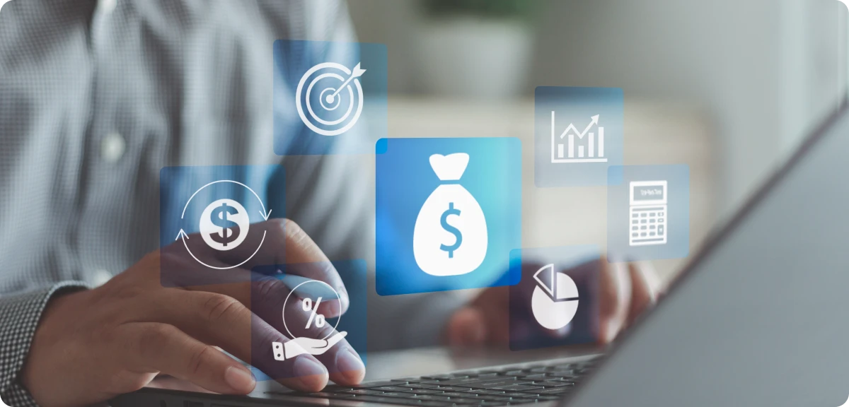 Person using laptop with finance icons overlay.